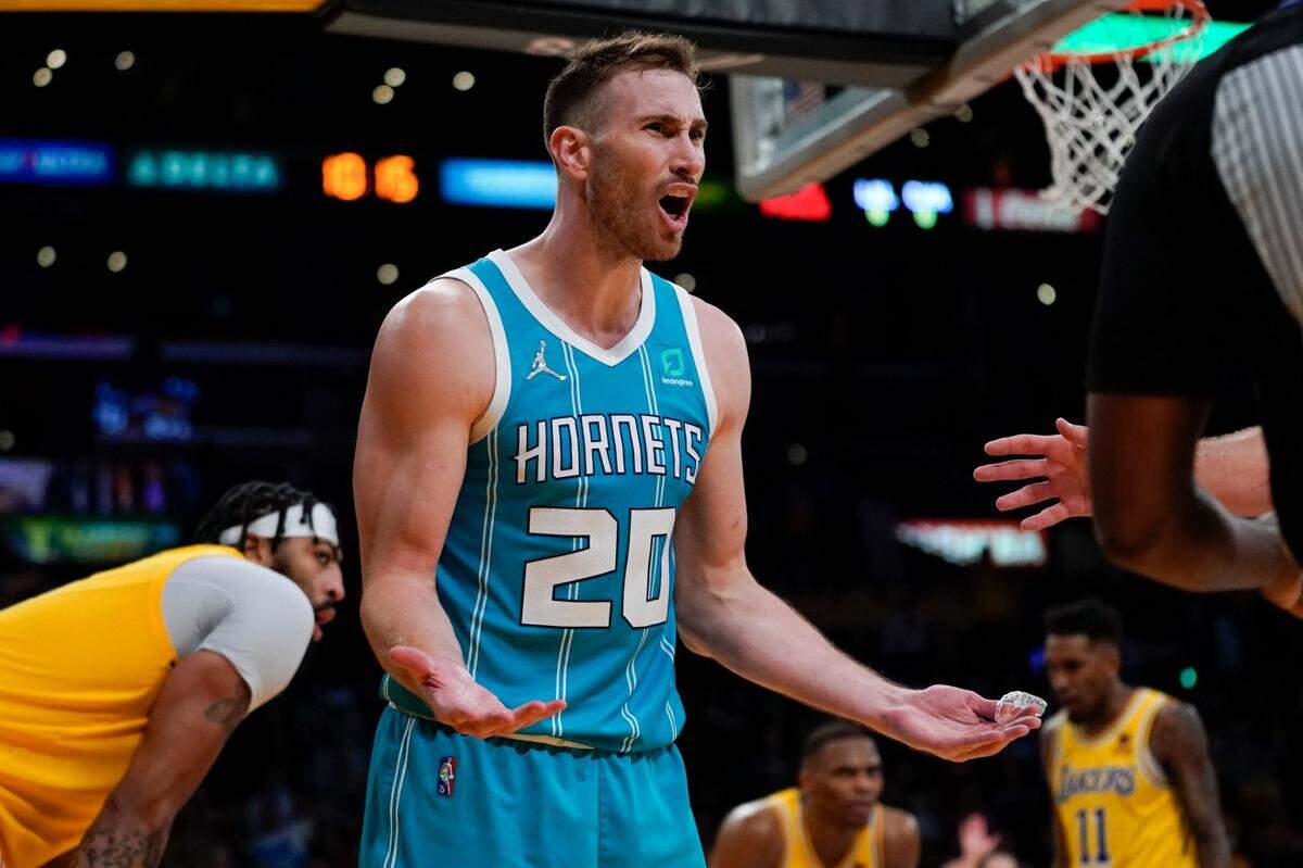 Charlotte Hornets forward Gordon Hayward (20) disputes an out of bounds call in overtime of an NBA basketball game against the Los Angeles Lakers in Los Angeles, Monday, Nov. 8, 2021. (AP Photo/Ashley Landis)