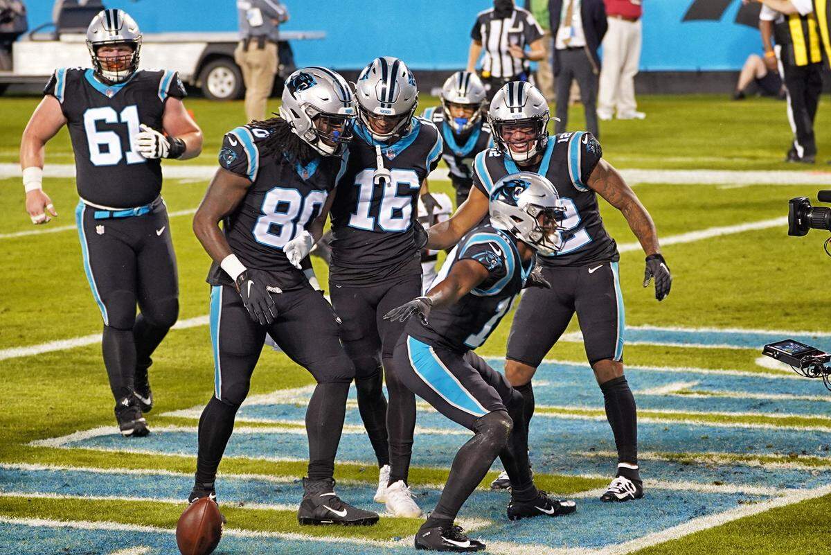 Carolina Panthers wide receiver Curtis Samuel (11) celebrates with teammates after scoring the team’s first touchdown against the Atlanta Falcons Thursday night, Oct. 29, 2020.