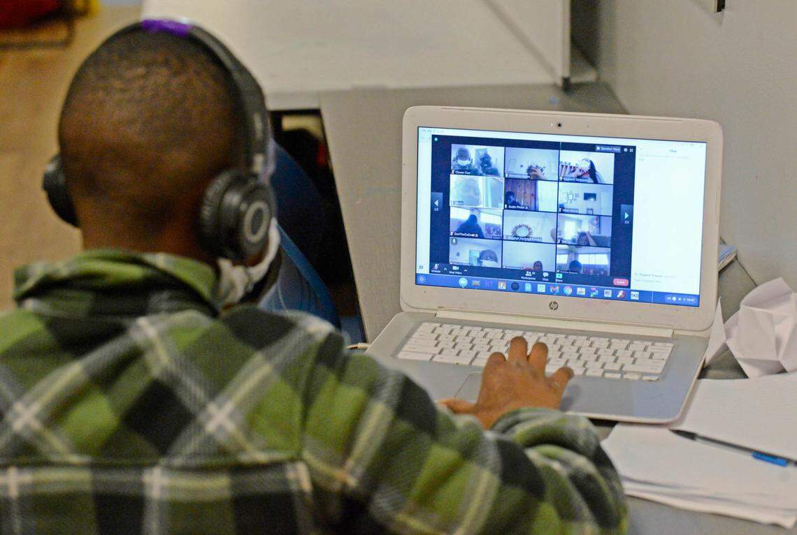 A student conducts his lessons on his laptop while at the YMCA of Greater CharlotteÕs School Days+ remote learning program at the Stratford Richardson YMCA on Wednesday, February 3, 2021. Families from all different schools enroll their kids in the program, which is offered at multiple YMCA locations. The Y provides a safe and supportive space for students to do their individual remote learning.