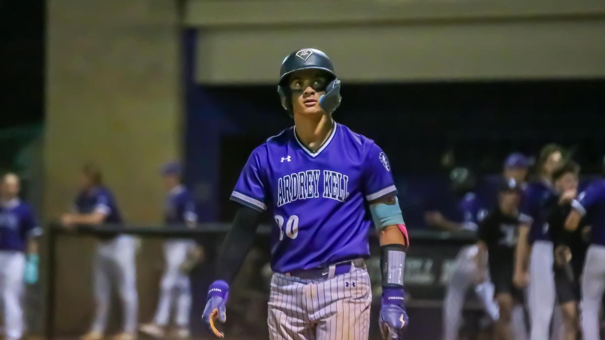 Ardrey Kell’s Brady Marconi looks to the scoreboard as he comes up to bat against Providence High on March 19, 2025 at Ardrey Kell high school in Charlotte, NC