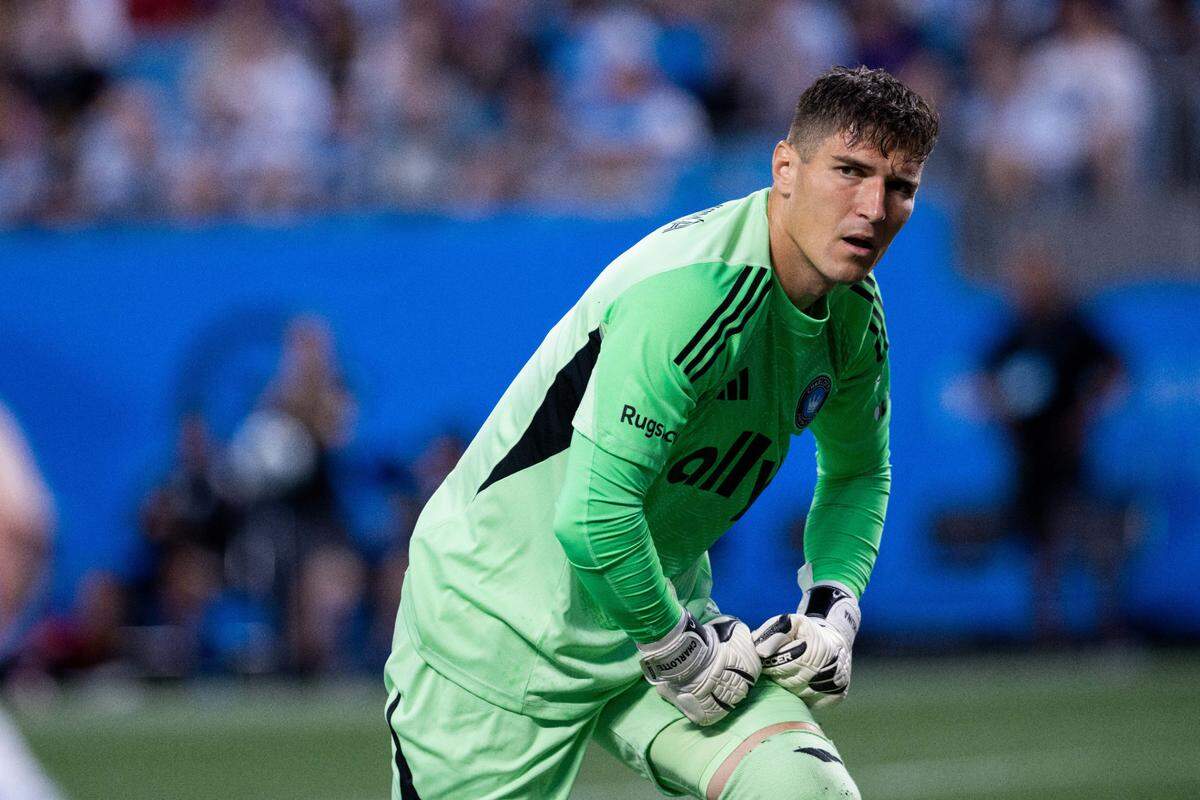 Charlotte FC goalkeeper Kristijan Kahlina (1) gets up during the first half against the Chicago Fire at Bank of America Stadium.