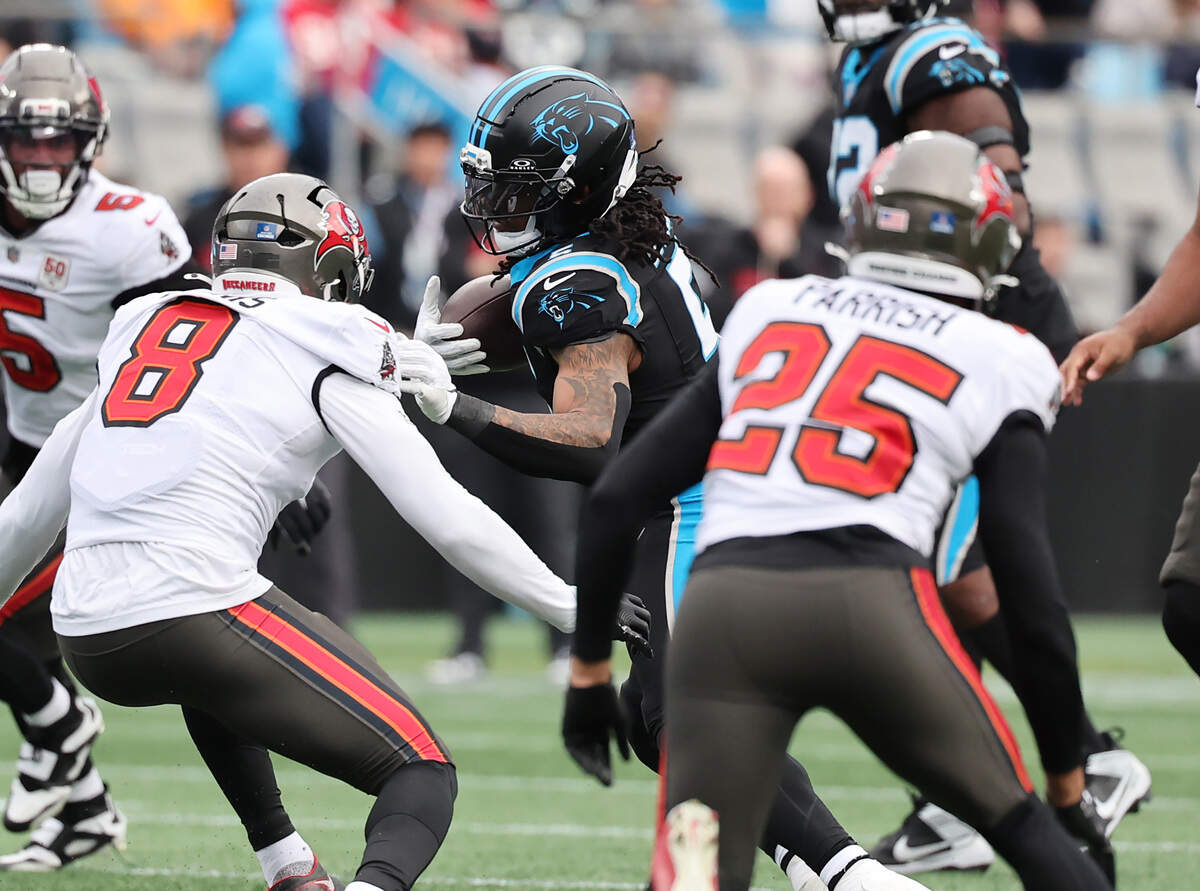 Carolina Panthers running back Rico Dowdle breaks to the inside against the Tampa Bay Buccaneers on Sunday at Bank of America Stadium in Charlotte.