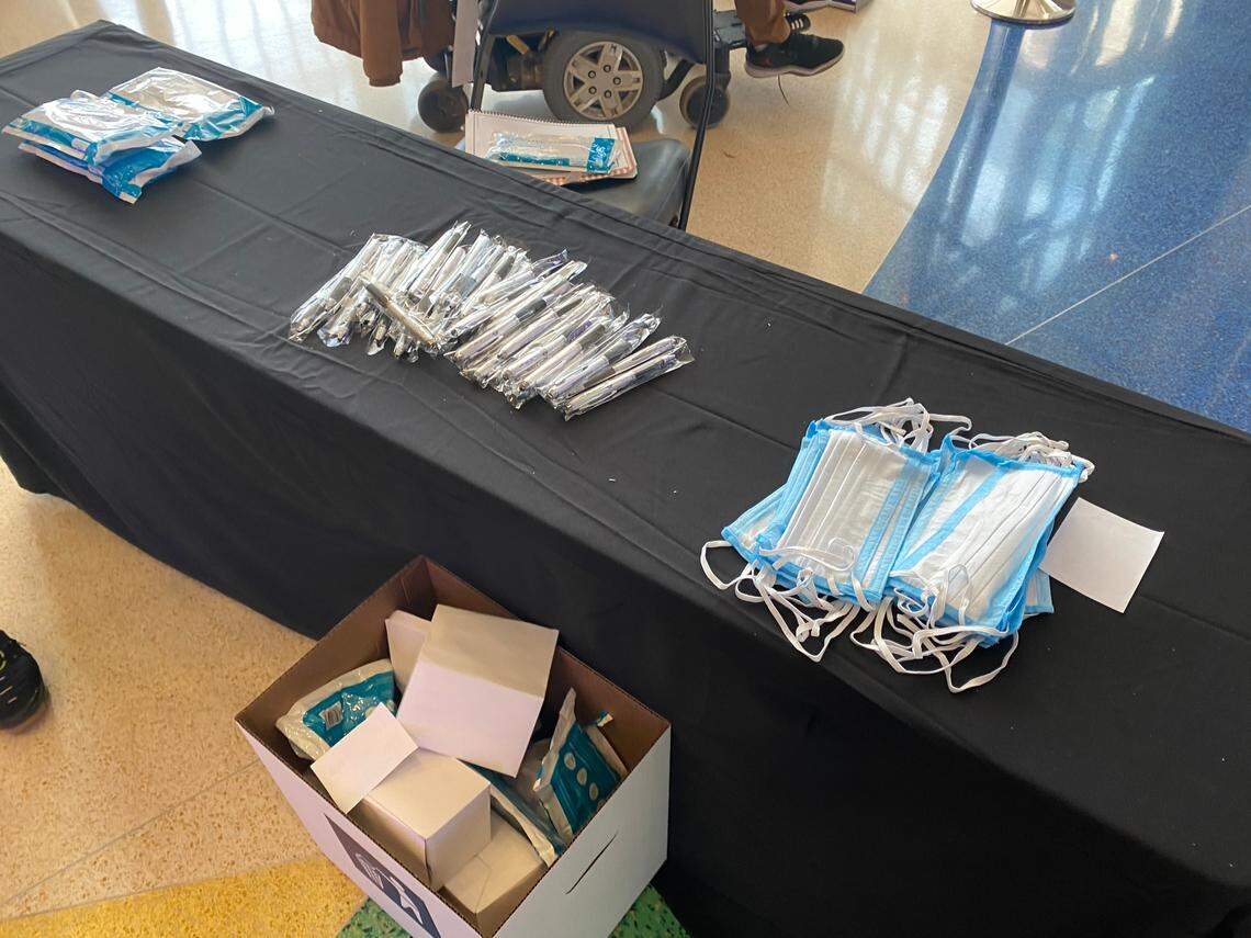 Masks and stylus pens are among the poll swag available during early voting in 2020.