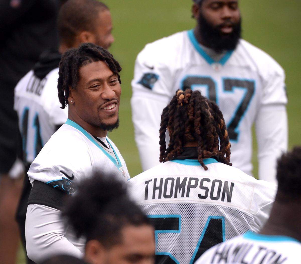 Carolina Panthers linebacker/defensive end Bruce Irvin, left, has been getting to know his new teammates like linebacker Shaq Thompson.
