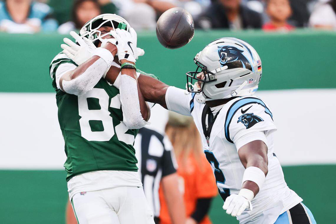 Carolina Panthers cornerback Mike Jackson (2) breaks up a pass intended for New York Jets wide receiver Arian Smith (82) in Sunday’s fourth quarter at MetLife Stadium.