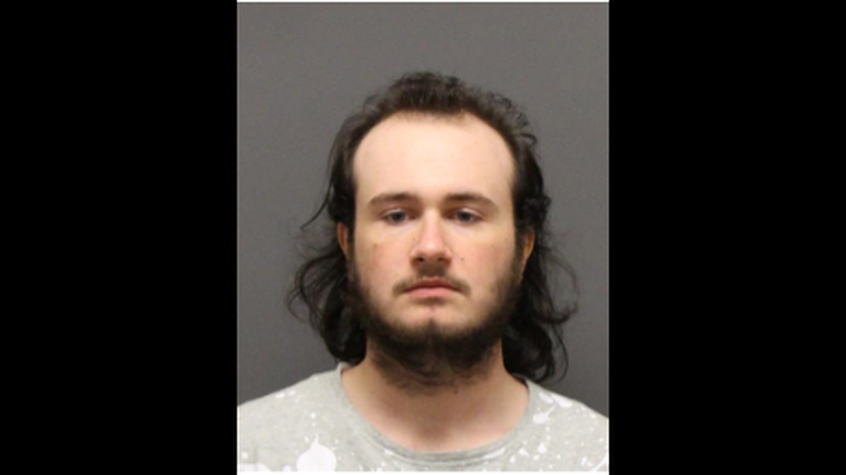 Carson Glenn Simmons, 20, of Winston Salem is wanted on a charge of first degree murder after body is found in burned Davidson County home.