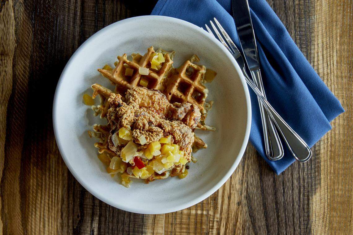 Buttermilk Fried Chicken Thighs on a buckwheat waffle with peach chutney.