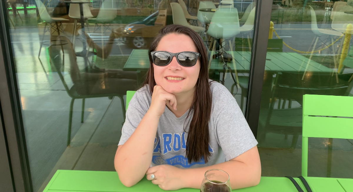 South End resident Celeste Pope drinks a beer at Hi-Wire Brewing on Thursday, Aug. 25, 2022.