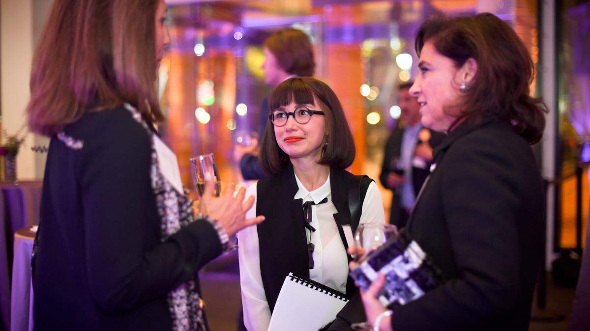 Anastasia James (center) is the new curator at the Bechtler Museum of Modern Art. She is pictured here at the museum’s Advisory Council and Board of Directors Art Dinner last month.