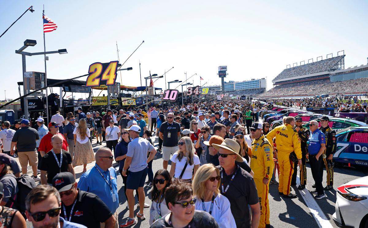 NASCAR fans fill pit road at Charlotte Motor Speedway prior to the Bank of America Roval 400 on Sunday, October 13, 2024 in Concord, NC.