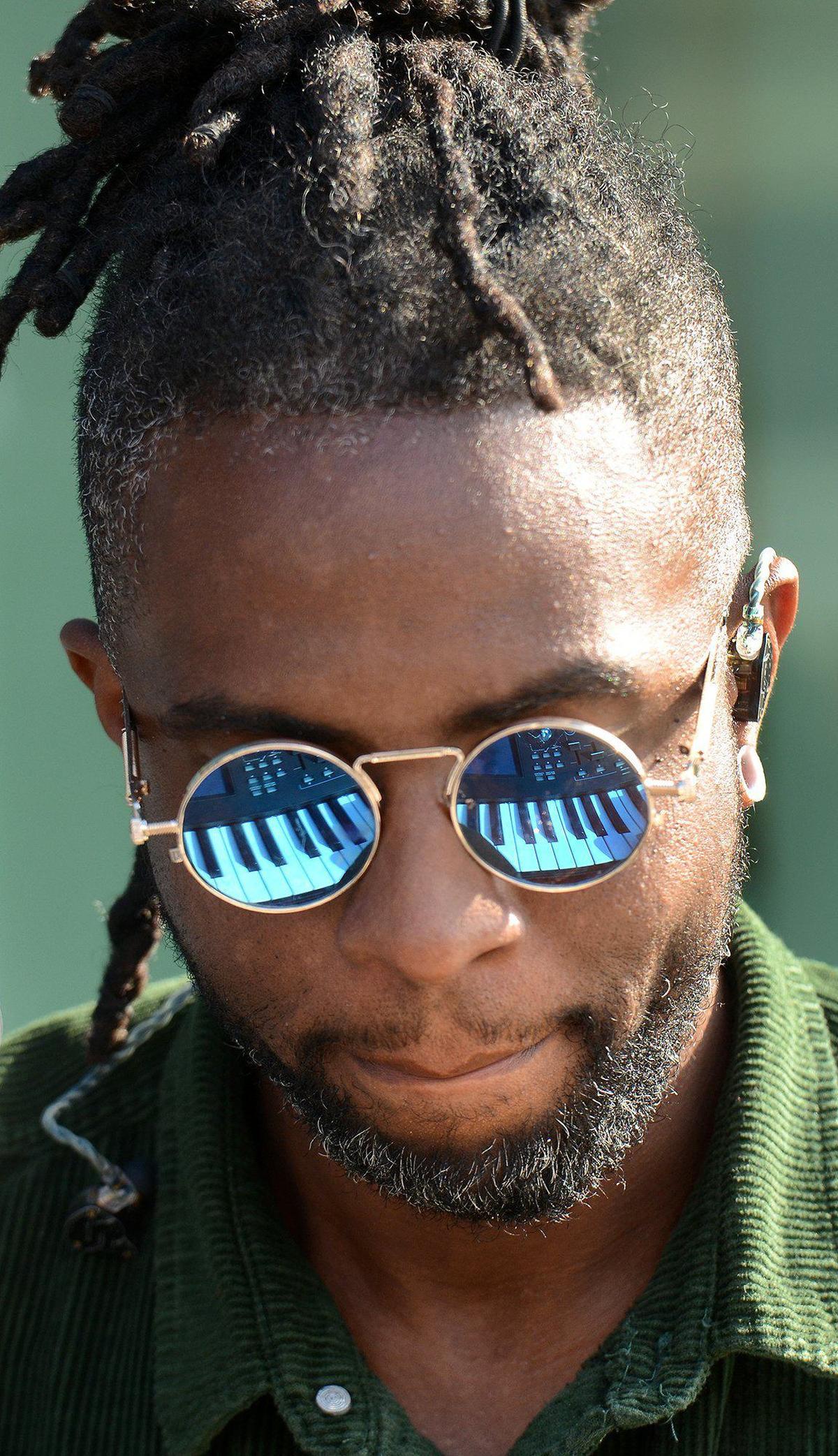 Jason Jet, a Charlotte recording artist, provided the musical entertainment at the ribbon-cutting ceremony at the C.W. Williams Community Health Center.