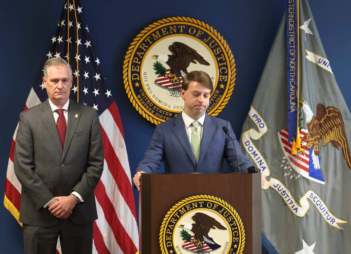 Russ Ferguson, U.S. attorney for the Western District of North Carolina, center, becomes emotional as he references a phone call that he and James Barnacle Jr., special agent in charge of the FBI Charlotte, had with the parents of Iryna Zarutska on Tuesday, Sept. 9, 2025.