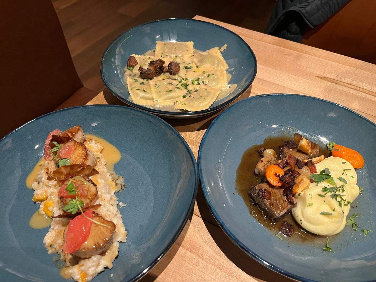 Napa’s Seared Scallops, Wild Mushroom Ravioli and Beef Bourguignon.