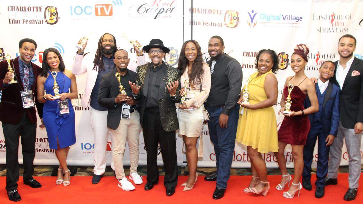 Tommy Nichols (fifth from left) with the winners of the 2022 Red Carpet Vision Awards at the Charlotte Black Film Festival. 