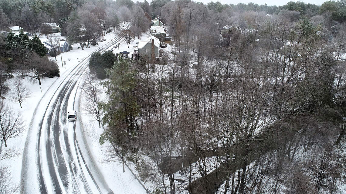 Snow tapers off but overnight refreeze will make roads hazardous in Charlotte region