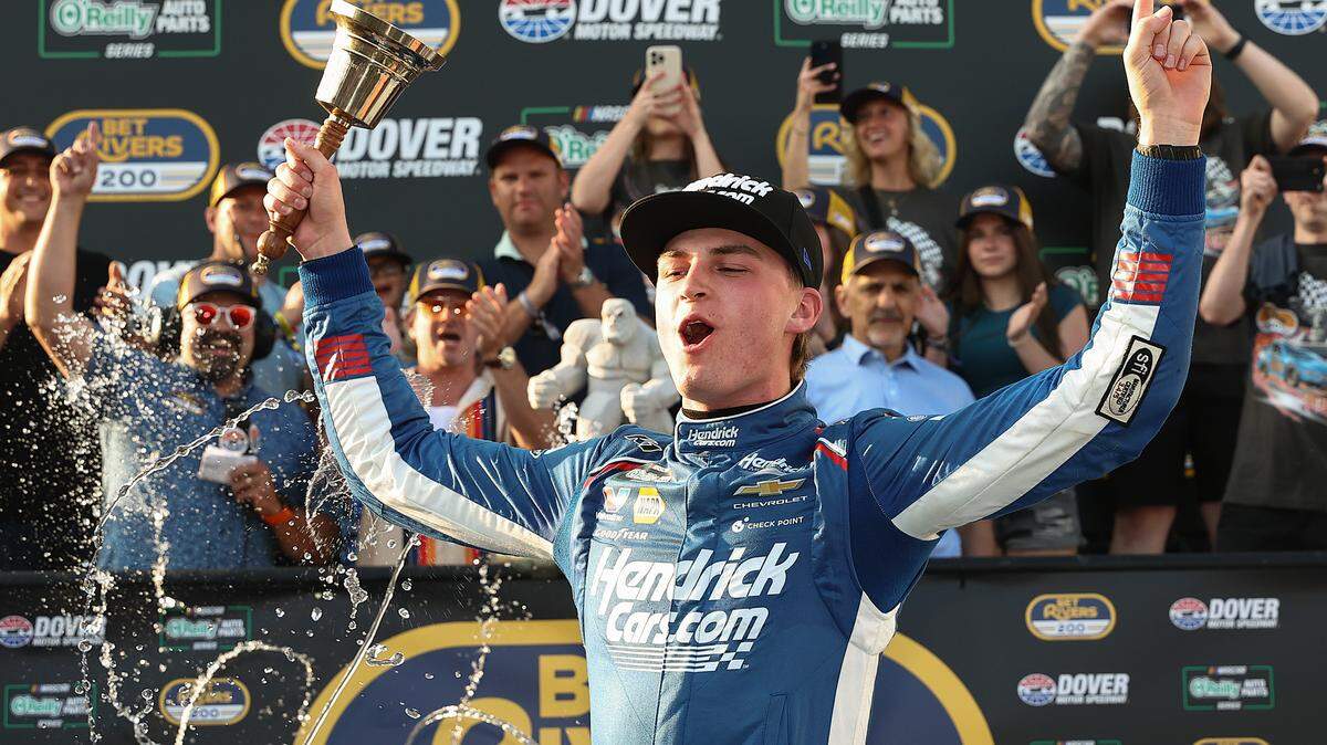 Corey Day, shown celebrating in victory lane after winning the NASCAR O'Reilly Auto Parts Series BetRivers 200 at Dover Motor Speedway on May 16, 2026 in Dover, Delaware, will replace the late Kyle Busch in Friday’s Track Series race at Charlotte Motor Speedway. Busch died Thursday at the age of 41. (Photo by Meg Oliphant/Getty Images)