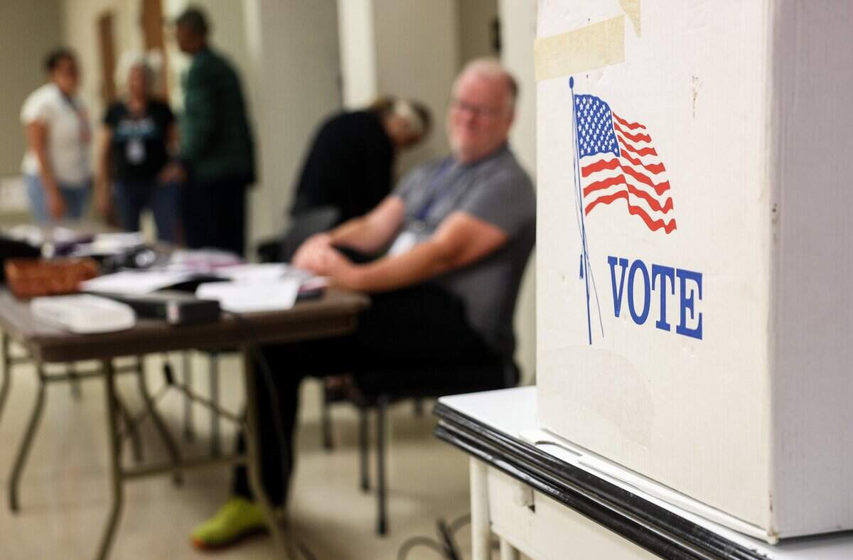 Election workers wait for voters at Sharon Presbyterian Church in south Charlotte during the primary election on Tuesday, Sept. 9, 2025.