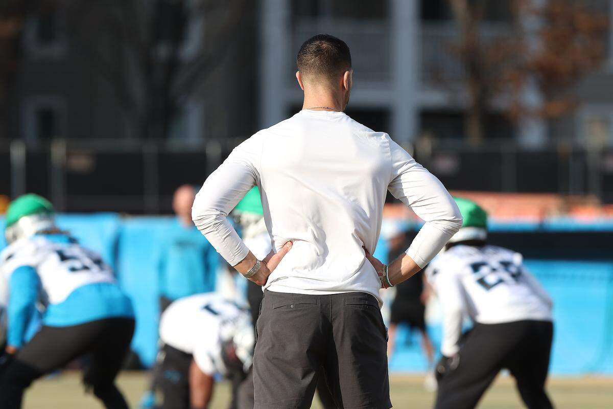 Carolina Panthers head coach Dave Canales watches his team run through drills during practice on Tuesday, January 6, 2026 in Charlotte, NC. The Panthers will host the Los Angeles Rams in first round action of the playoffs at Bank of America Stadium on Saturday, January 10, 2026.