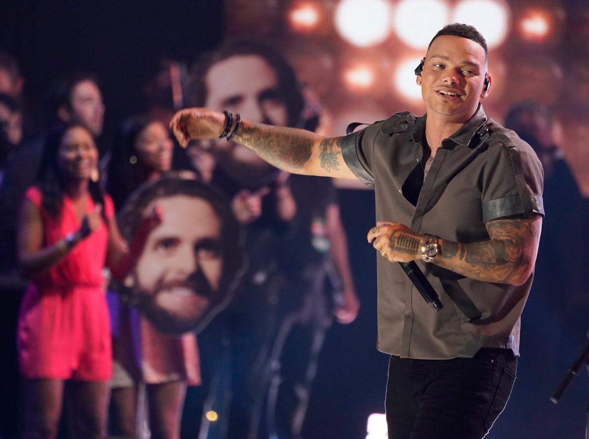 Kane Brown performs “Famous Friends” at the CMT Music Awards at the Bridgestone Arena in June in Nashville, Tenn.