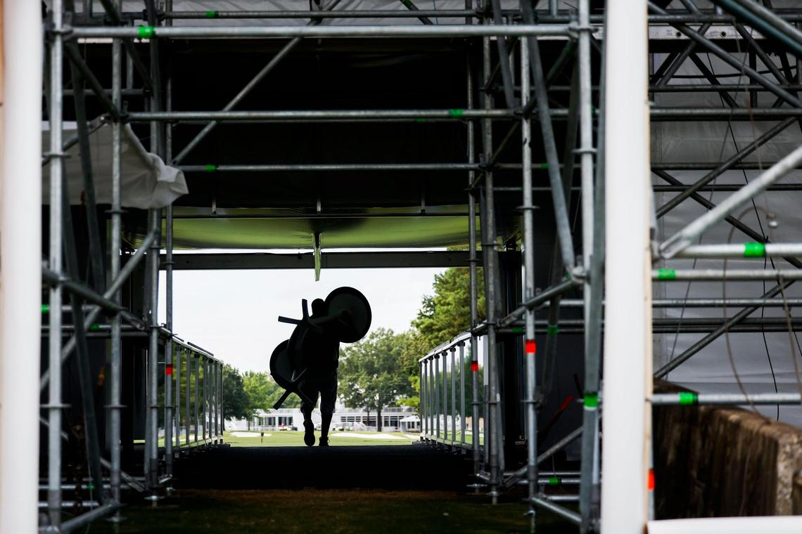 Tables are set up around the first tee at Quail Hollow Club in Charlotte, N.C., Friday, Sept. 9, 2022.