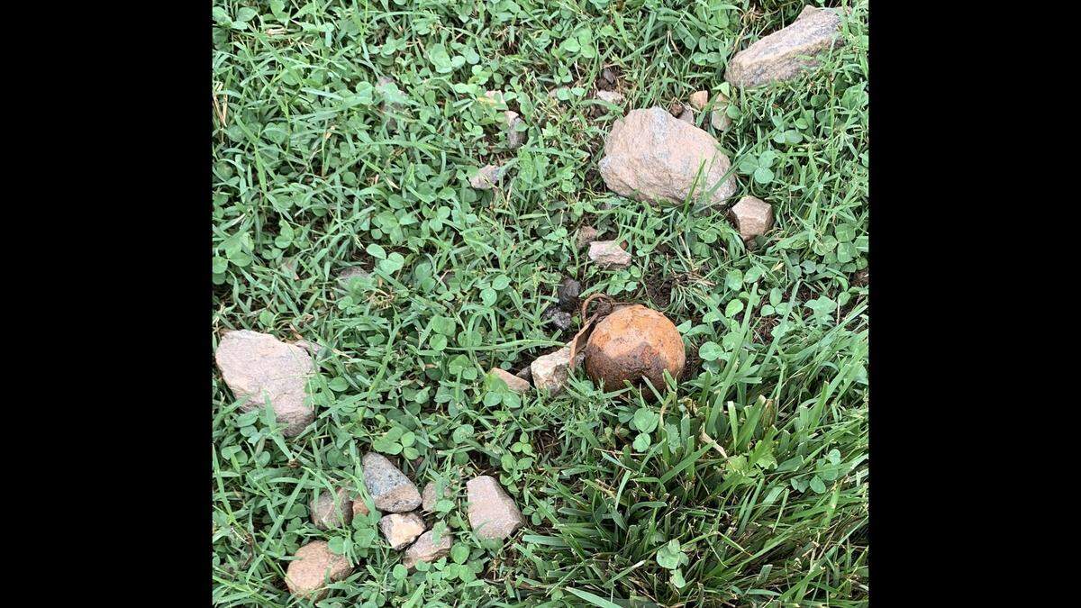It's suspected the grenade flowed into the yard during downpour Saturday, Aug. 3, officials say. 