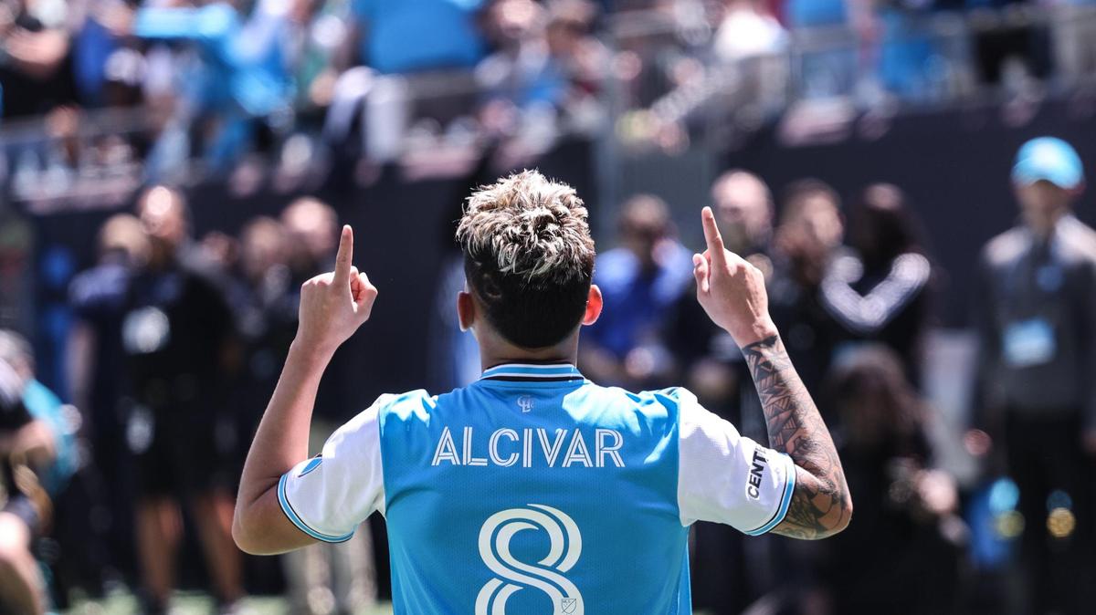Charlotte FC midfielder Jordy Alcívar points up at the sky after scoring a goal against Atlanta United at Bank of America Stadium in Charlotte on Sunday.