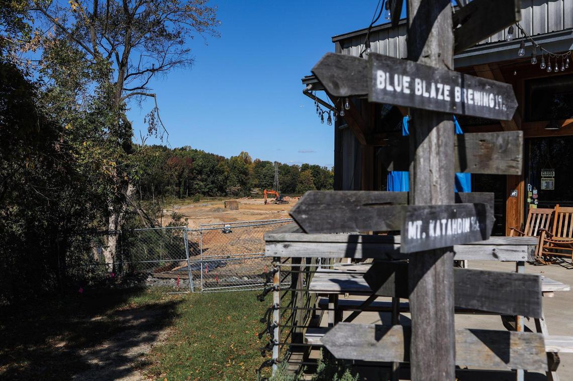 Work is underway on a 27-acre development being led by Atlanta-based Portman Holdings. Blue Blaze Brewing opened on the property about six years ago. Portman’s project will bring office, retail and apartments to the site in west Charlotte.