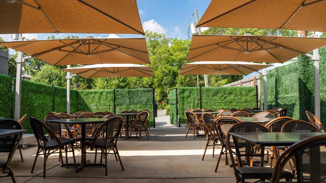 The outdoor garden patio at Dilworth Tasting Room in Plaza Midwood.