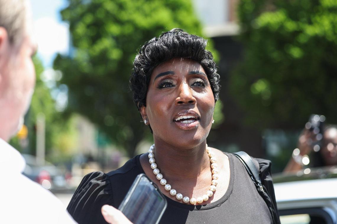 City Councilwoman Tiawana Brown talks with media upon leaving the courthouse in uptown Charlotte on Friday.