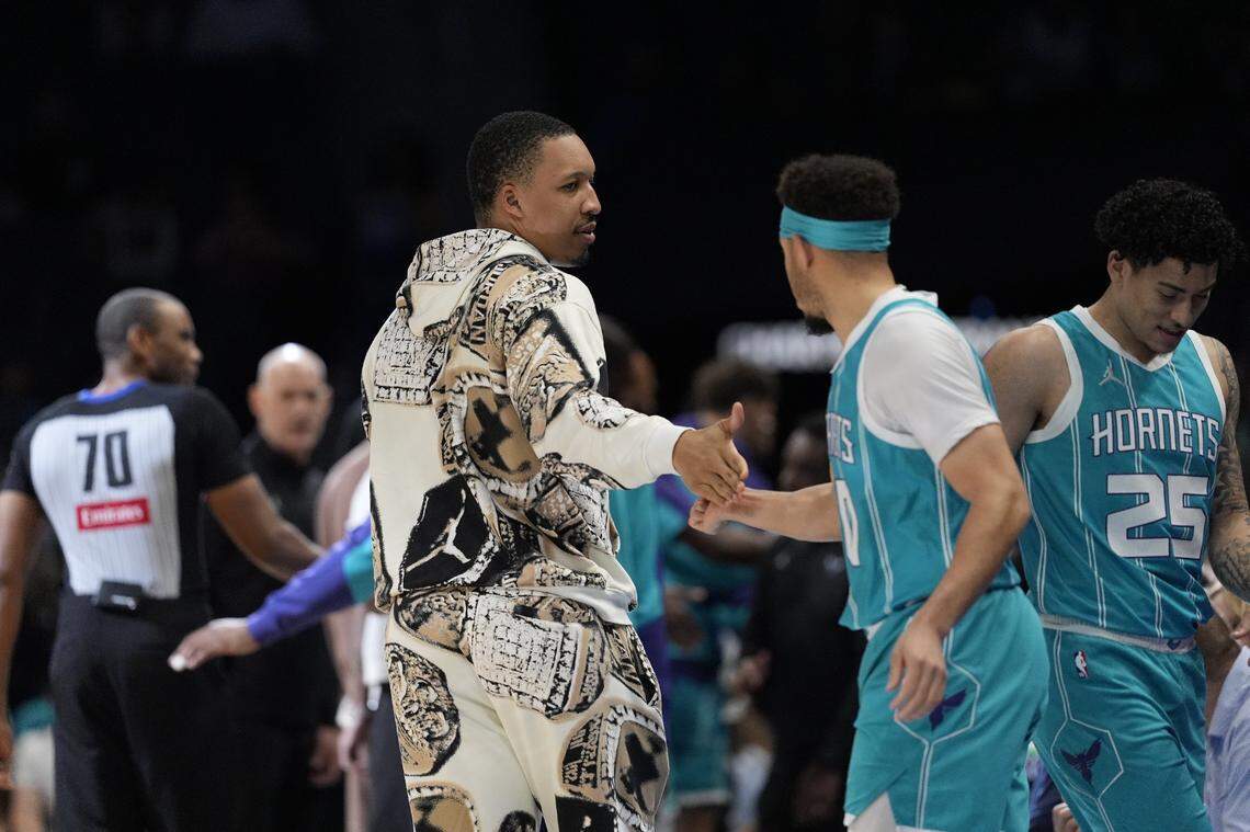 Charlotte Hornets forward Grant Williams (2) hypes up his teammates before the start of the first quarter against the Sacramento Kings at Spectrum Center.