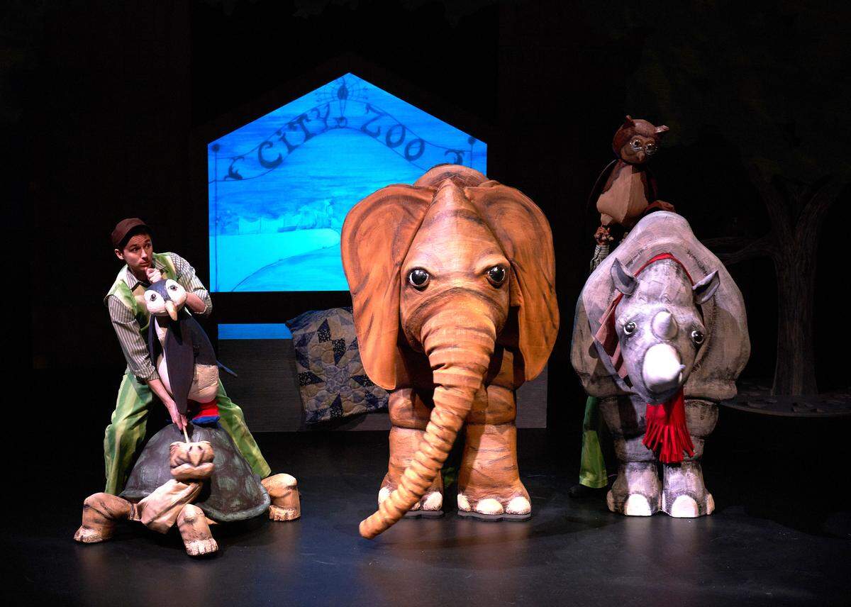 Amos McGee rigs footraces with his zoo animal friends for a spry old tortoise in the Children’s Theatre of Charlotte production of the Caldecott Medal-winning story “A Sick Day for Amos McGee.”