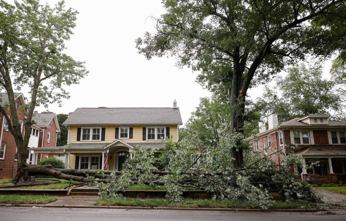 A fallen tree lays across the yard of a home along the 900 block of South York Street in Gastonia, N.C., Thursday, May 9, 2024 after severe storms yesterday afternoon caused damage and power outages in the area.