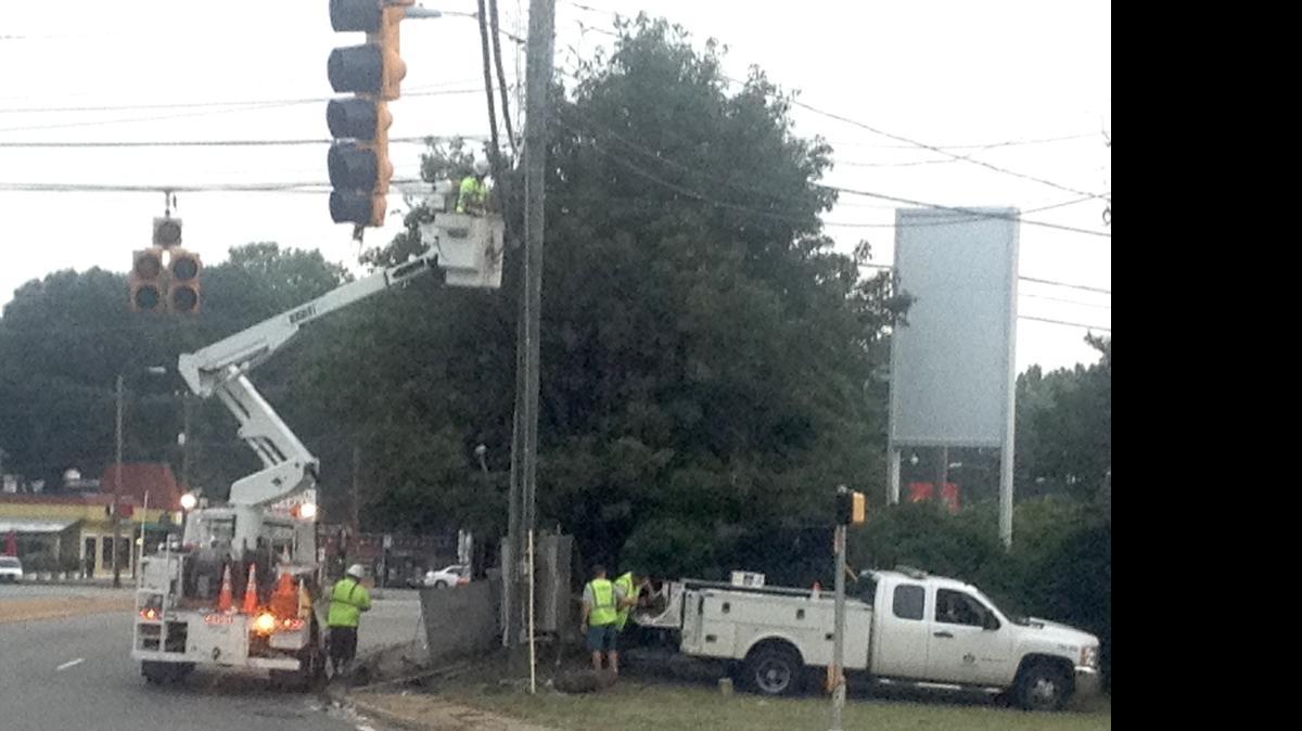 
Albemarle Road is closed at Sharon Amity Road in east Charlotte Wednesday morning, after an overnight wreck downed power lines at the intersection
