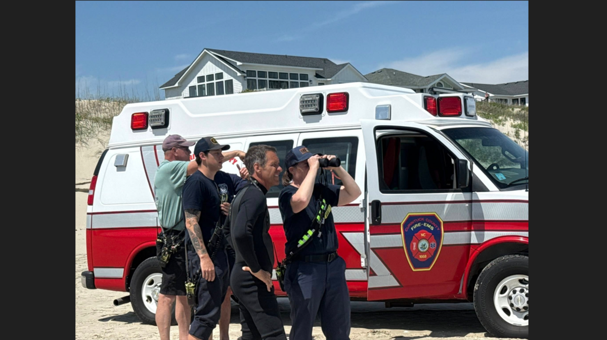 The rescue happened Wednesday morning near Corolla, and all three people suffered symptoms of hypothermia, the Corolla Fire & Rescue Squad says.