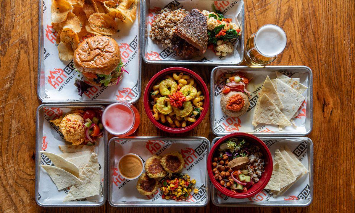 Hot Box Next Level Kitchen serves up burgers and other sandwiches, along with elevated fare such as its Hot Box Grain Bowl.