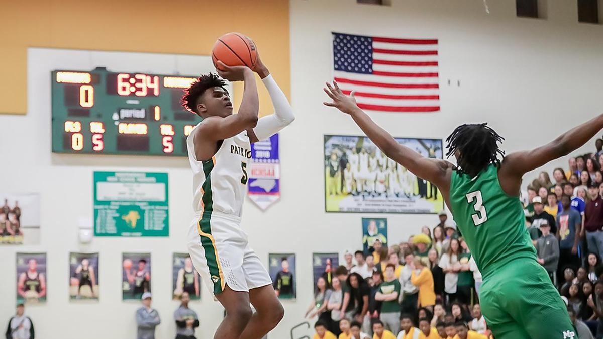 Independence Andra’ McKee (5) pulls up for the 3-point attempt during early first quarter action.