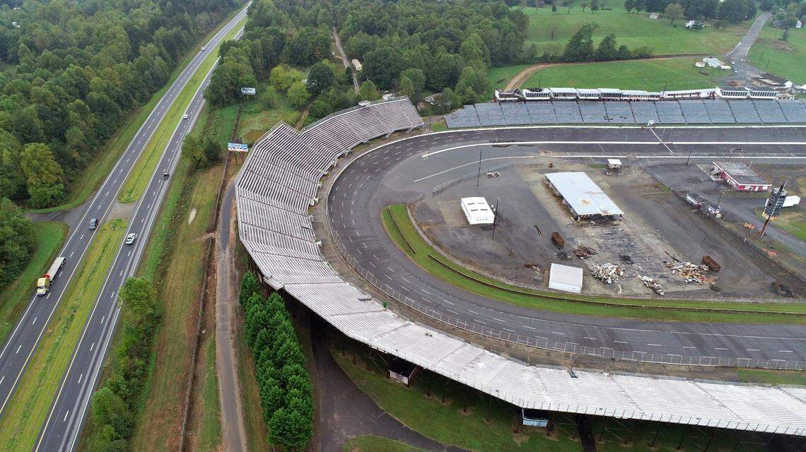 North and South bound traffic on U.S. Route 421 passes by the grandstand in turns one and two at North Wilkesboro Speedway in North Wilkesboro, NC on Thursday, October 7, 2021. North Wilkesboro Speedway was a NASCAR short track. The track operated from 1949 until 1996.