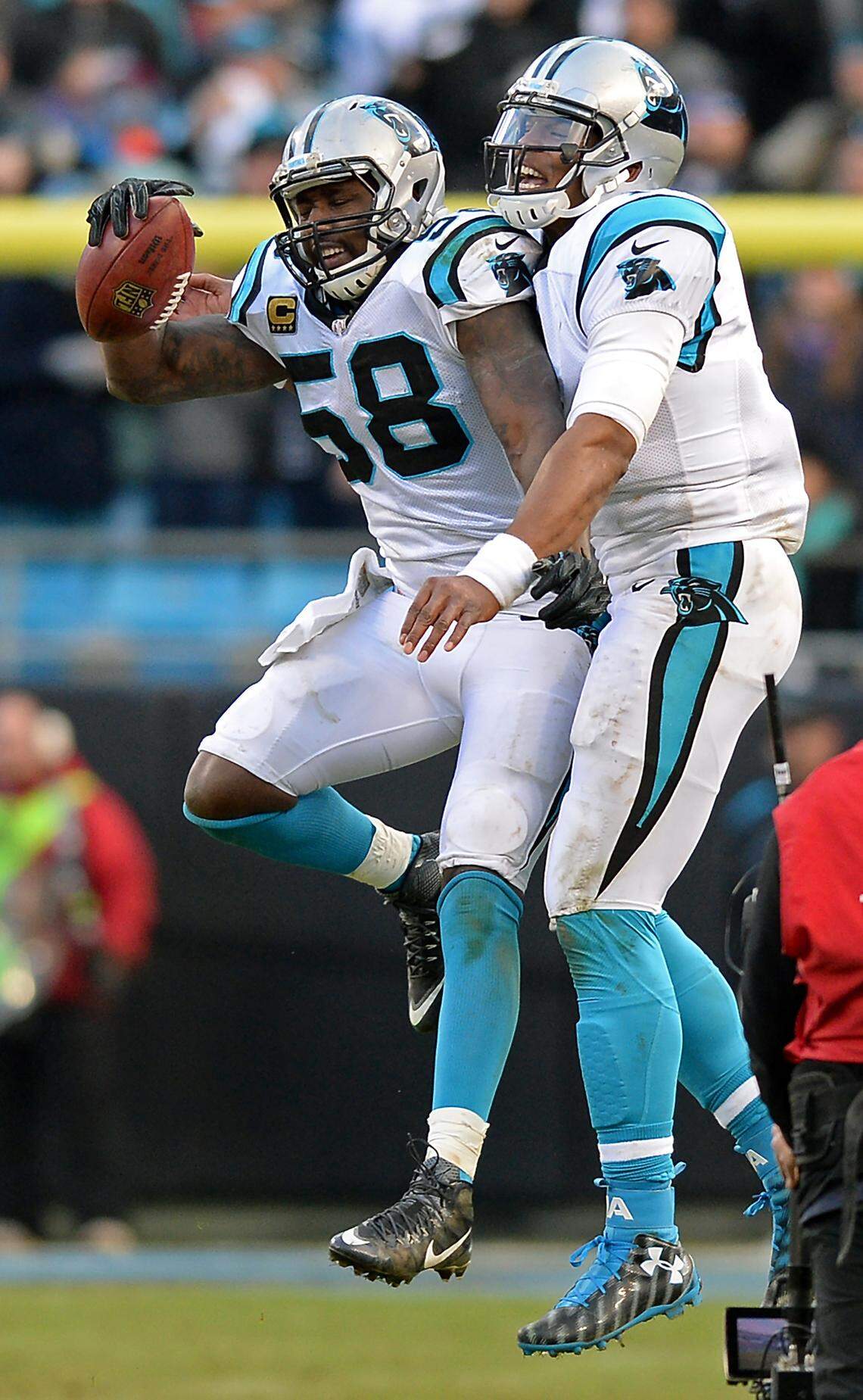 Carolina Panthers linebacker Thomas Davis, left, and quarterback Cam Newton celebrate Davis’s recovery of an onside kick against Seattle. The two were fierce rivals in practice. “If I won a rep against him or if we won a rep against them, I’m letting him hear about it. I’m letting him know every single time and vice versa,” Davis said of Newton.