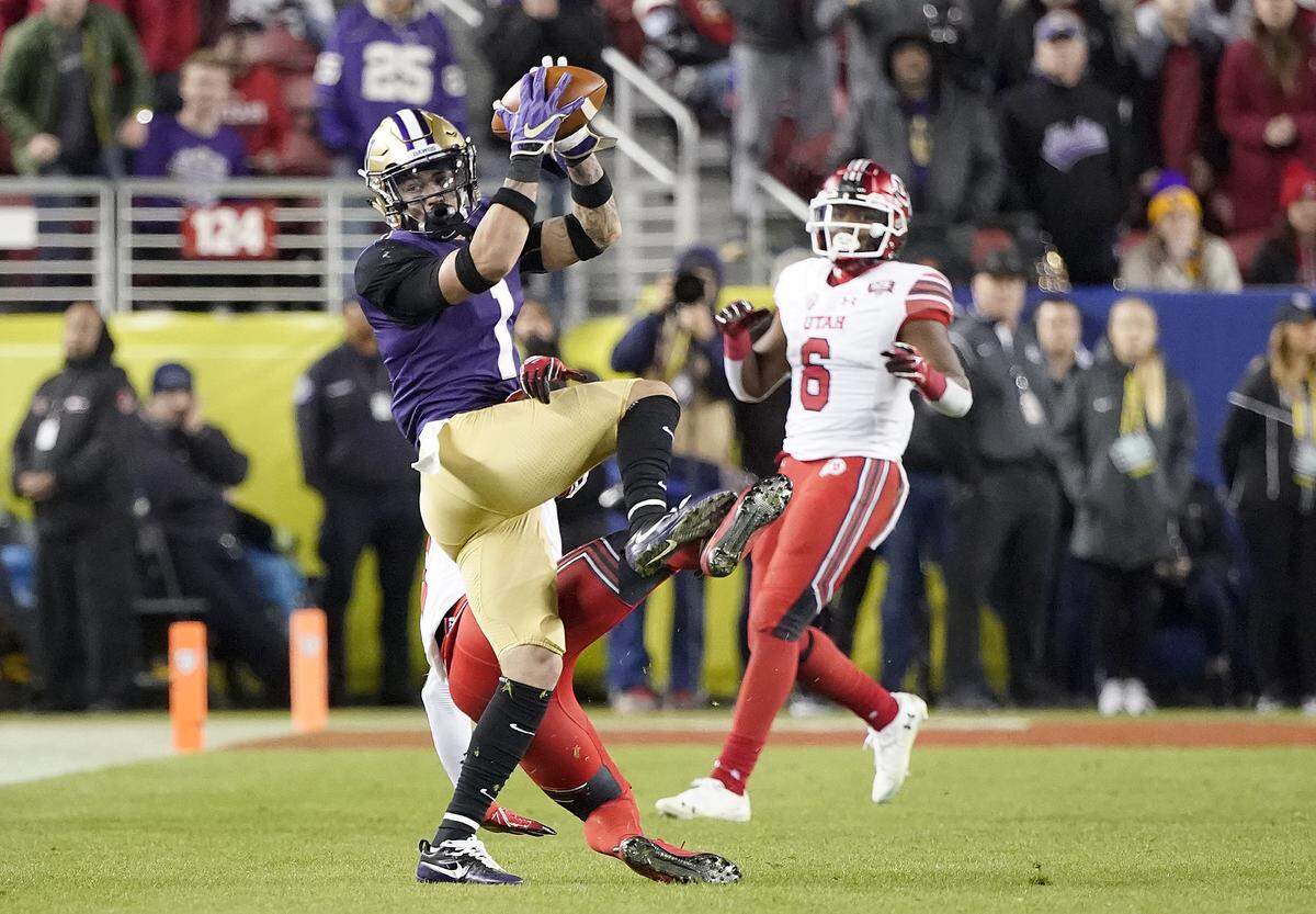 Washington defensive back Byron Murphy, left, intercepts a pass against Utah during the second half of the Pac-12 Conference championship NCAA college football game in Santa Clara, Calif., Friday, Nov. 30, 2018. (AP Photo/Tony Avelar)