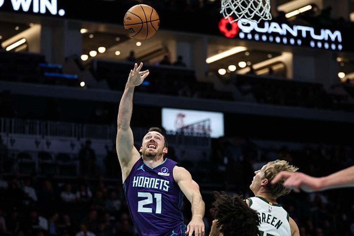 Pat Connaughton of the Charlotte Hornets lays the ball up during the first half of a basketball game against the Milwaukee Bucks at Spectrum Center on Nov. 12, 2025 in Charlotte, North Carolina. 