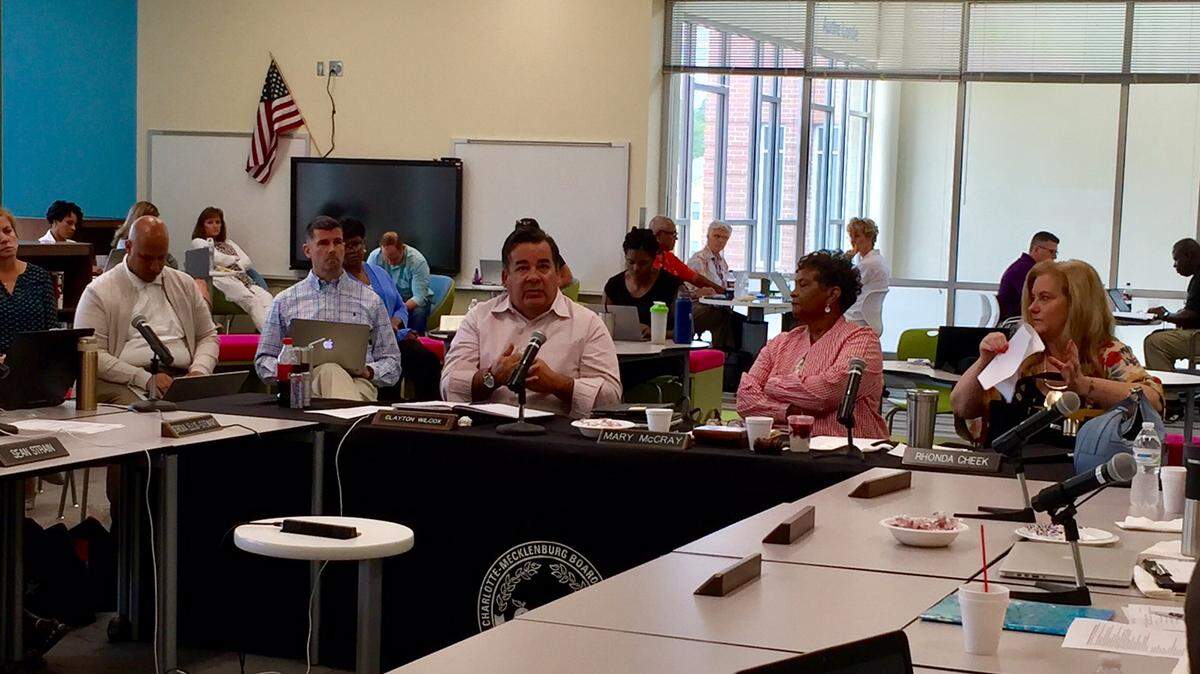 Superintendent Clayton Wilcox talks to the Charlotte-Mecklenburg school board Friday at a two-day summer retreat at Renaissance West STEAM Academy.