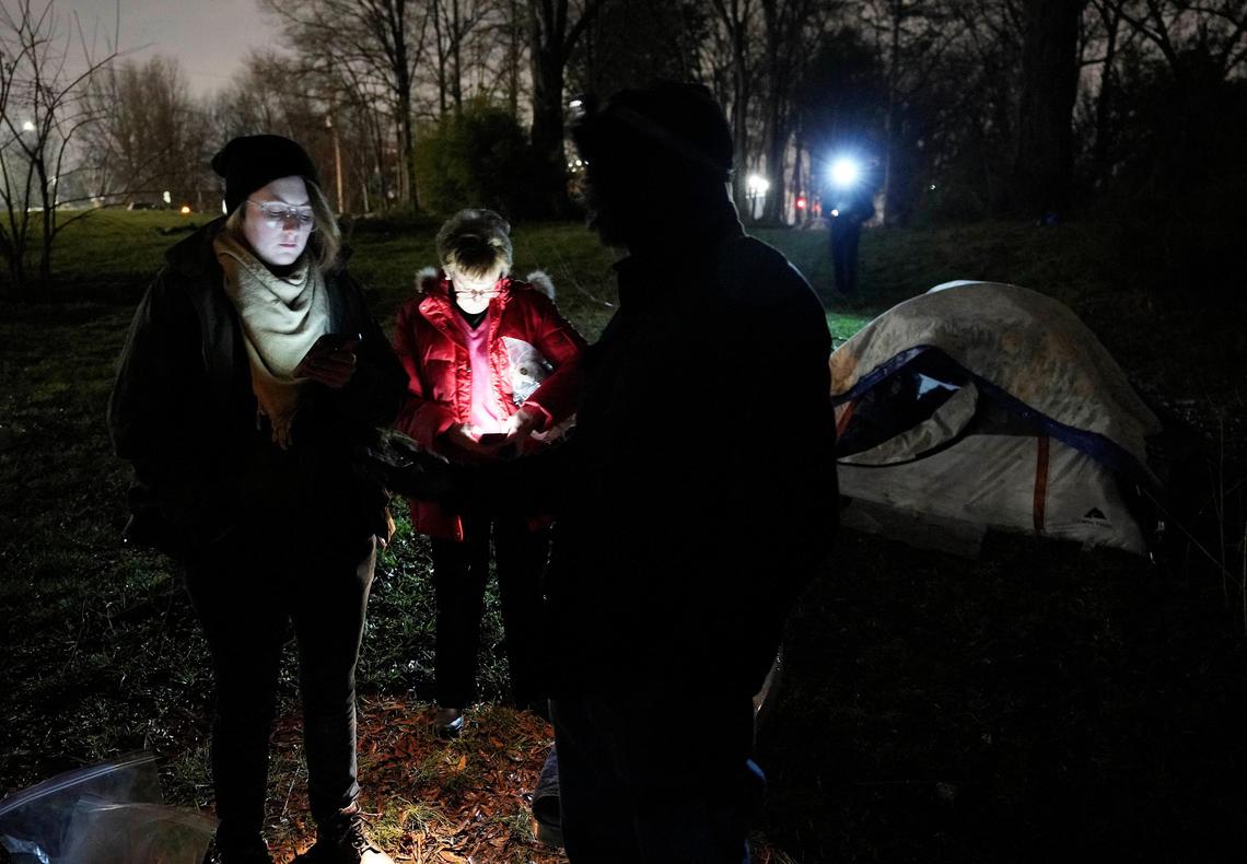 Homeless advocate Jessie Allen and Mecklenburg County Commissioner Pat Cotham listen as Bruce, a homeless person, offers suggestions for programs to help the homeless community during the annual ‘point in time’ canvas of the homeless near uptown Charlotte on Thursday, January 30, 2020.