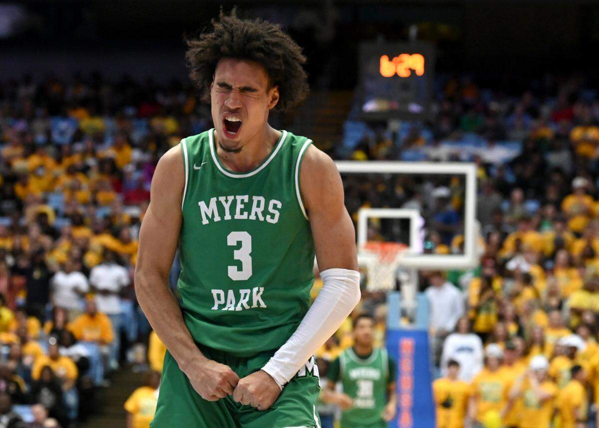 Myers Park’s Bishop Boswell screams in celebration of the team’s play against Richmond Senior in the NCHSAA 4A championship game at the Dean Smith Center on Saturday, March 11, 2023. Myers Park defeated Richmond Senior 74-60.