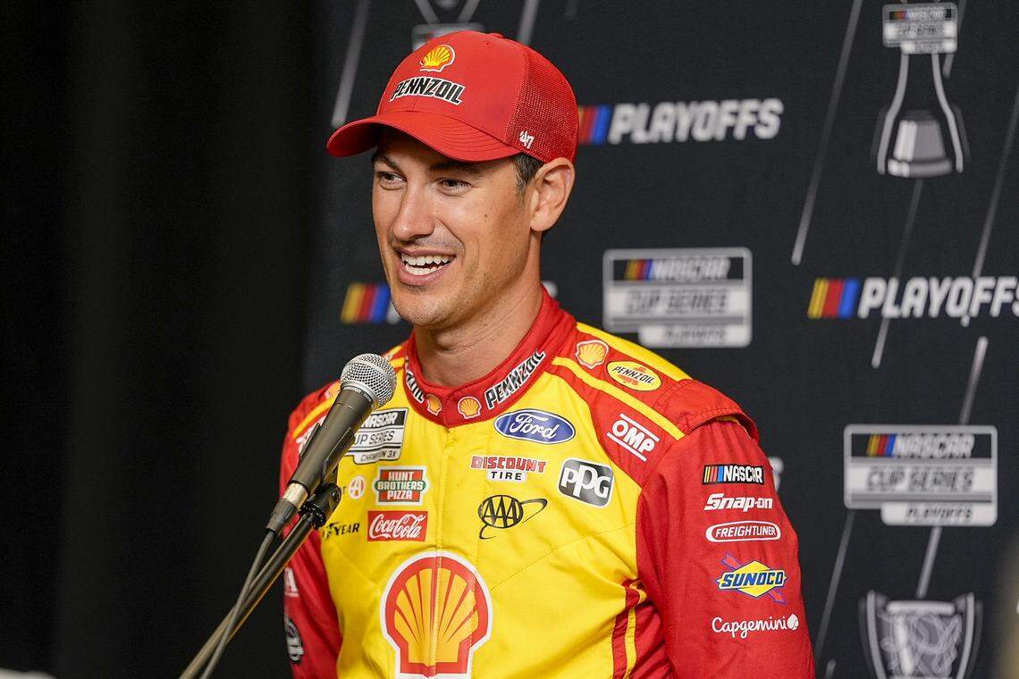 Aug 27, 2025; Charlotte, NC, USA; Joey Logano answers questions from the media during NASCAR Cup Series Playoff Media Day at Charlotte Convention Center.
