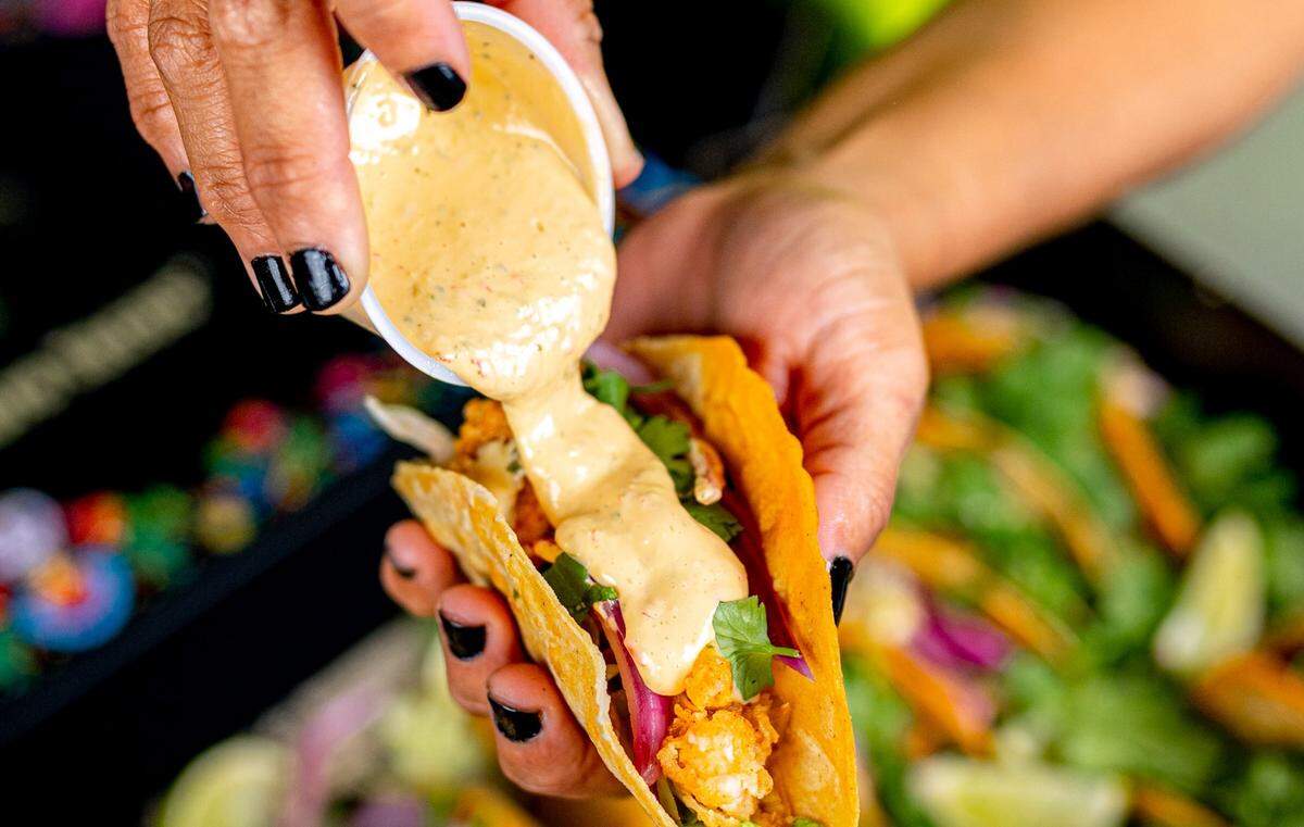 Talkin’ Tacos offers 11 taco options, including Bang Bang Shrimp with spicy mayo.