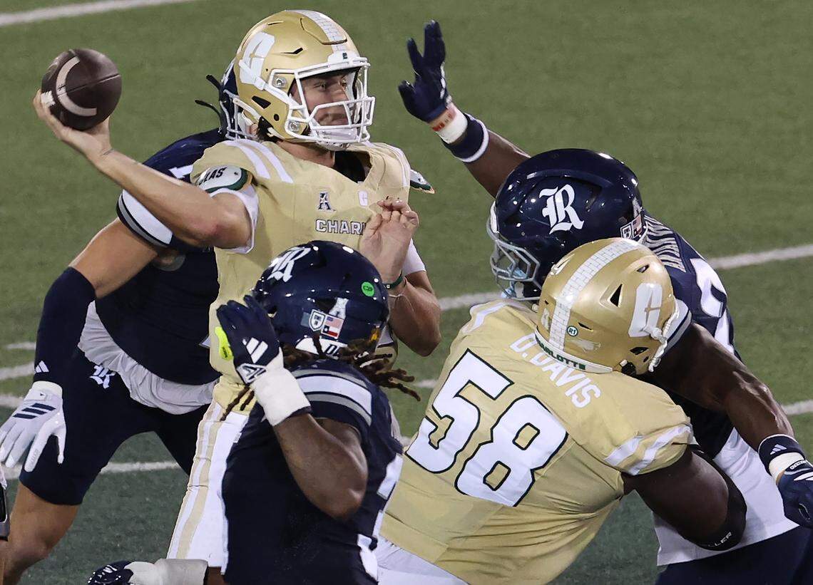 Charlotte 49ers quarterback Grayson Loftis stands in the pocket looking to pass as the Rice Owls defense rushes during action on Thursday, September 18, 2025 at Jerry Richardson Stadium in Charlotte, NC. Rice defeated Charlotte 28-17.