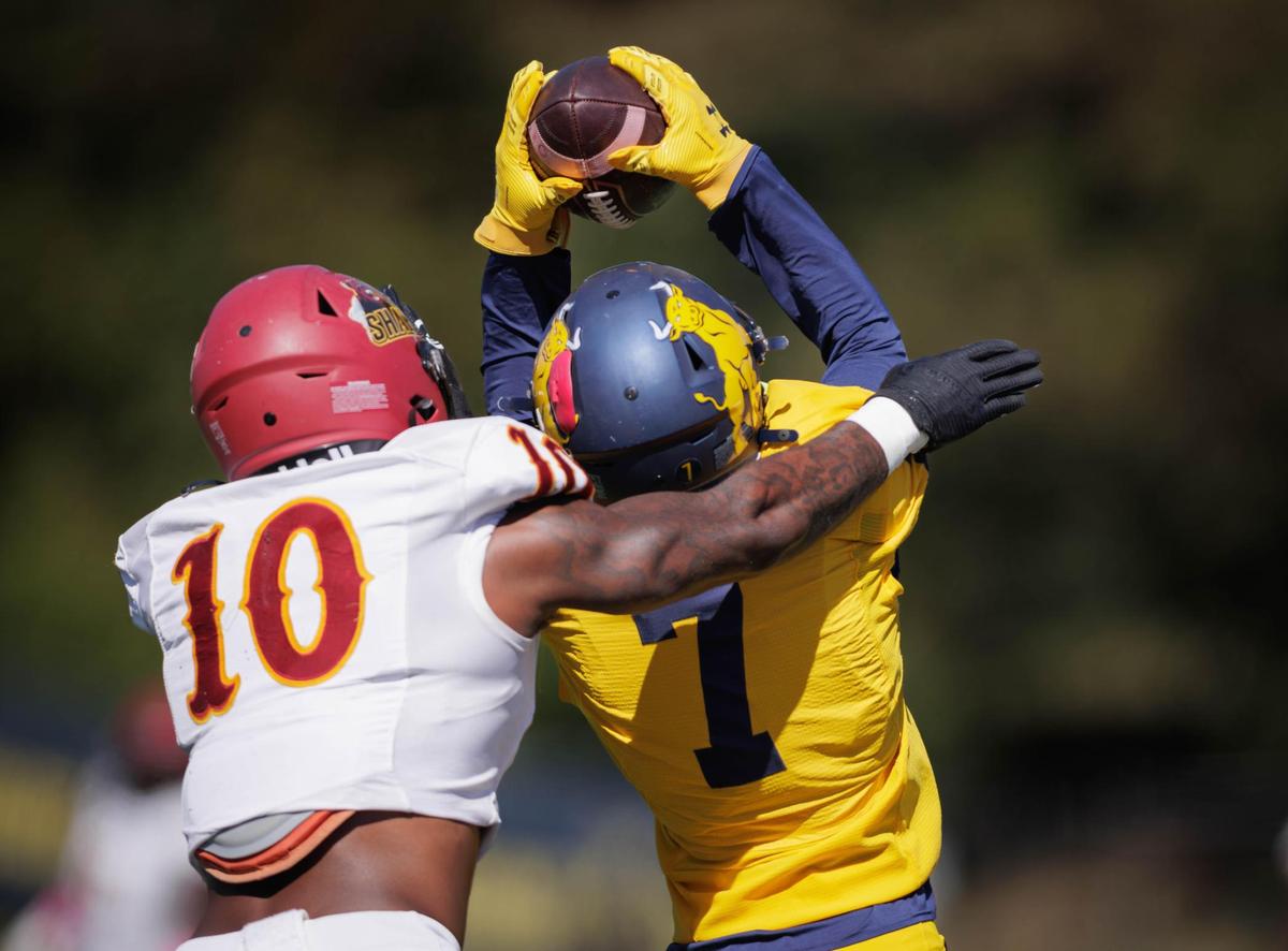 The Bulls Blake McCullough (7) makes the touchdown catch. The Bulls go to 7-0 as they defeat Shaw University 21-14 Saturday October 19, 2024.