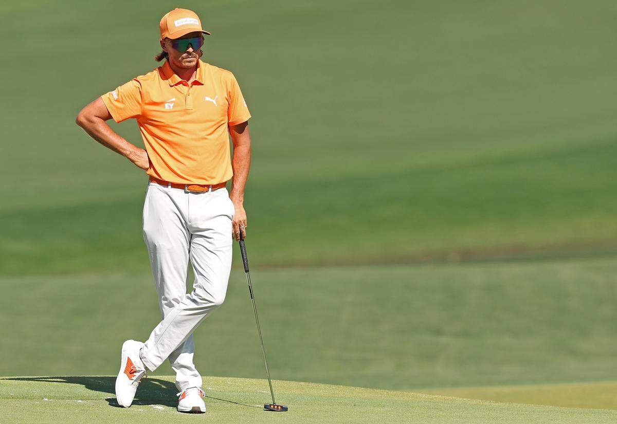 Rickie Fowler stands along the 15th green waiting to putt during the final round of the Truist Championship at Quail Hollow Club in Charlotte, NC on Sunday, May 10, 2026. Fowler finished tied for second place at -13 for the championship.