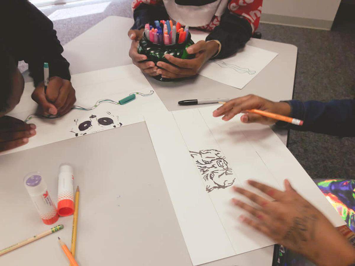 Guerilla Poets held an art workshop for students from TYM Inc. (Transforming Youth Movement) at the West Boulevard library branch in July 2019. Guerilla Poets’ workshops help kids, teens and adults use art to work through difficult emotions and experiences.