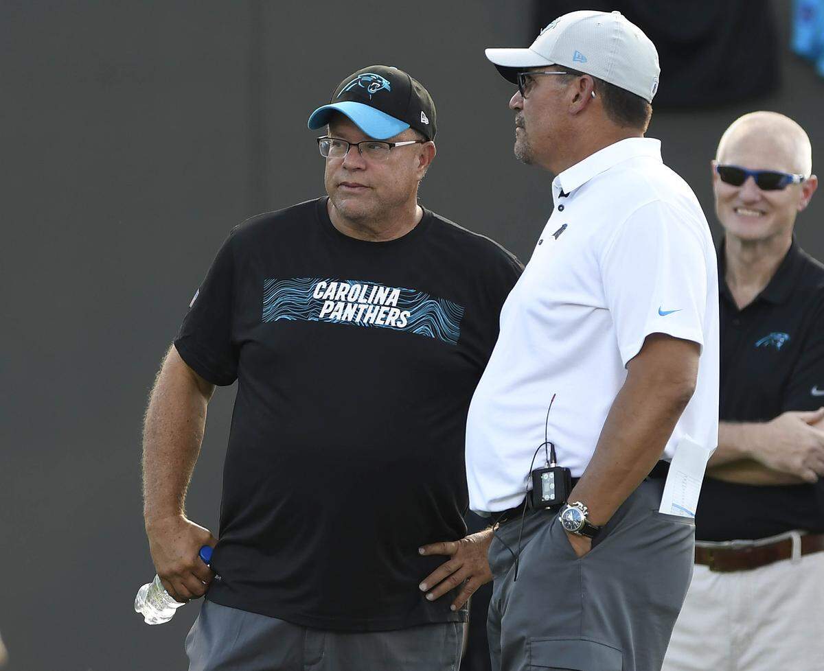Carolina Panthers owner David Tepper talks with head coach Ron Rivera during the first practice at Training Camp 2018 in Gibbs Stadium at Wofford College in Spartanburg, SC.